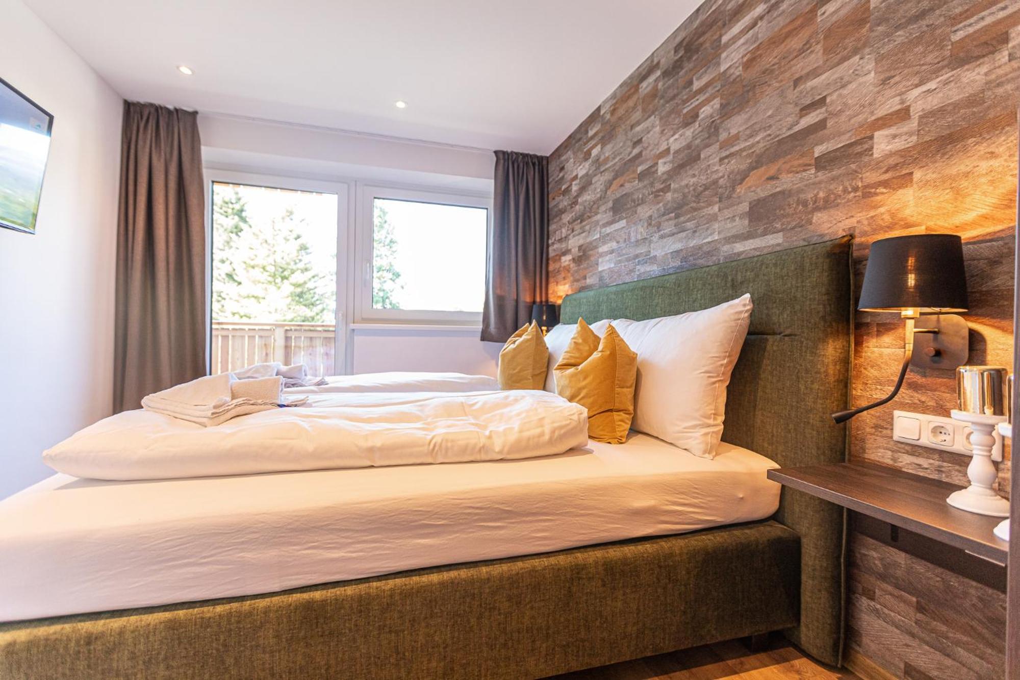 Tevini Boutique Suites By We Rent Zell am See Værelse billede